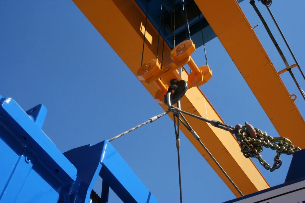 Powerful crane hook. Industrial background